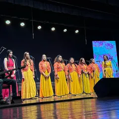 A wider view of our incredible teachers united in song at the 'Jugalbandi' showcase. Their harmony on stage reflects the collaborative spirit we foster in our training programs.