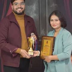 Celebrating the success of a talented student from my makeup master course. She holds her certificate and trophy, ready to take on clients with her new skills.