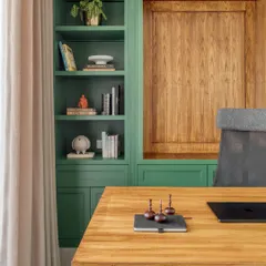 A detailed shot of the built-in shelving in the Dubai Hills study. We styled the shelves with books and personal objects that reflect the clients' personality, making the functional storage also a point of visual interest.