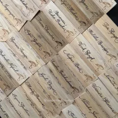 Here is a look at over 50 custom wooden name plates I created for a corporate event. Each name is handwritten in elegant calligraphy, showing my ability to work on unique surfaces like wood and handle large-scale orders for weddings or brand activations, ensuring every guest feels personally welcomed.