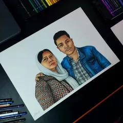 A hyper-realistic colour pencil sketch of a mother and son for a client in Rajasthan. This A3 piece took about 24 hours, focusing on the fabric patterns and expressions.