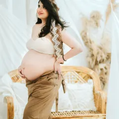 A confident pose showing off the beautiful baby bump. This shot is part of my "Maternity, Unfiltered" series, celebrating the strength and power of the female body.