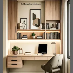 This elegant study unit features a light wood finish and clean lines. The design includes open bookshelves and a wide desk with drawers, all beautifully illuminated by warm, integrated LED lighting.