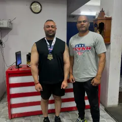 With my coach after winning gold at the Delhi State Championship and qualifying for Nationals.
