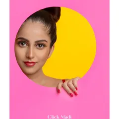Clean, graphic, and full of personality. This shot uses a simple circular cutout to create a strong focal point, letting the model's expression and the vibrant color palette do all the talking. It’s a great style for influencers and brands wanting a fresh, modern aesthetic.