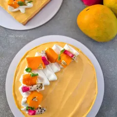 When Alphonso mangoes are in season, my egg-free mango cheesecake is a must-try. It has a creamy, melt-in-the-mouth texture and is packed with the natural sweetness of real Alphonso mangoes, topped with fresh fruit and a hint of edible gold leaf.