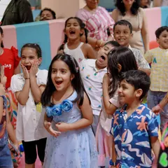 This is the look of pure wonder we strive for. Our parties are filled with surprises, from magic shows to confetti blasts, that capture the full attention and imagination of our little guests, creating priceless reactions like these.