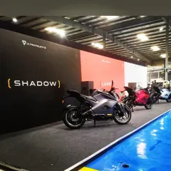 A lineup of motorcycles at the Ultraviolette brand activation event. I designed this display zone to allow guests to see the products up close in a sleek, gallery-style setting that reinforces the brand's identity.