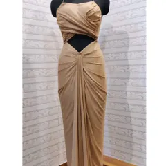 This draped fusion gown showcases my love for modern, architectural designs. The strategic cut-out, halter neckline, and fluid draping come together to create a piece of custom evening wear that is both sophisticated and daring.