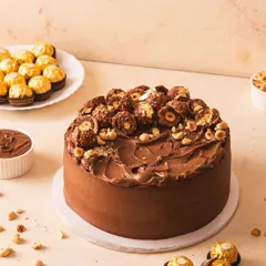 For all the Nutella and hazelnut lovers, this one is for you. Layers of soft, egg-free dark chocolate sponge, fluffy 54% Belgian chocolate mousse, and swirls of Nutella, topped with Ferrero Rochers.