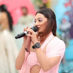 A close-up shot of me in my element, hosting a wedding carnival at The Leela Jaipur. My focus is always on the guests and making sure they are having an incredible time.