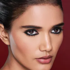This close-up for the Lovechild by Masaba beauty campaign highlights my precision with dramatic eye makeup. The graphic, reverse winged eyeliner is sharp and symmetrical, designed to make the product the hero of the shot.