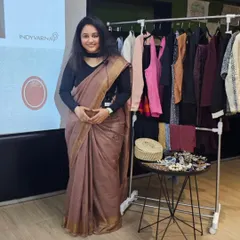 A full view of the workshop space. Having a clothing rack on hand allows me to give live demonstrations on fabric, fit, and creating different professional looks.