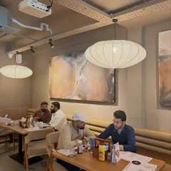 My large-scale fluid abstract paintings installed at Sidewalk cafe in Lucknow. It makes me so happy to see people enjoying their meals surrounded by my art.