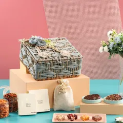 This grey woven jute hamper offers a more muted and sophisticated color palette. It's a versatile option that can be styled for any occasion, from corporate events to personal celebrations.