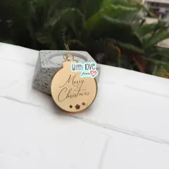 This is my classic bauble-shaped Christmas ornament. The clean design and beautiful script make it a timeless piece that you can use year after year on gifts or as part of your holiday decor.
