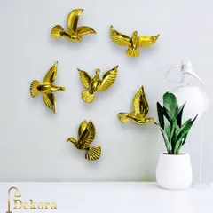 This set of six golden birds can be arranged in a flowing pattern to create a sense of freedom and movement on your wall.