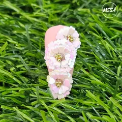 This stunning 3D floral piece was created by one of our talented students. They used a sequin-layering technique to build each flower, showing incredible patience and skill.