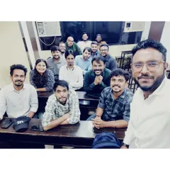 A selfie taken during a teachers' meeting. Our faculty regularly collaborates to plan curriculum and teaching strategies.