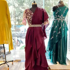 A full view of the designer ruffle ready-to-wear saree. This outfit provides the elegance of a saree with the ease of a gown, making it a popular choice for clients who want a stylish, hassle-free option.