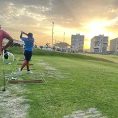 A beautiful sunset view from our junior practice area. We provide a serene and inspiring environment for golfers to practice and relax.