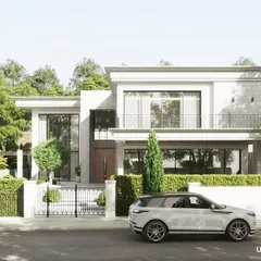 This elegant white villa design showcases a classic modern aesthetic with clean lines, a minimalist color palette, and thoughtfully placed greenery. The design focuses on creating a sense of sophisticated tranquility, perfect for a luxury family residence.