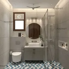 To make this small toilet feel more spacious and vibrant, we used a bold blue and white chevron pattern for the floor tiles, paired with simple, light-colored wall tiles.