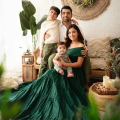 So much love in one frame. This family portrait in my cozy, boho-themed studio setup captures a relaxed and happy moment between parents and their two boys.