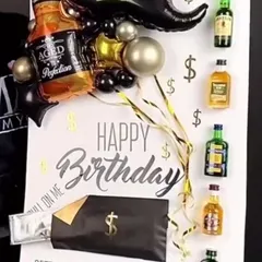 A life-sized birthday card for him. This fun arrangement includes a balloon display with a mustache and liquor bottle foil balloons, mini liquor bottles, and an envelope with cash.