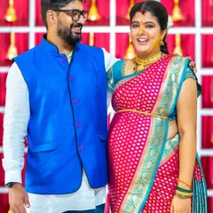 The look of pure love and excitement between expecting parents is something truly special. This candid moment from their baby shower is filled with so much warmth and anticipation.
