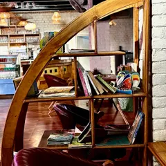 I've set up a small library with a variety of books for you to enjoy. It's all about creating a space where you can truly relax.