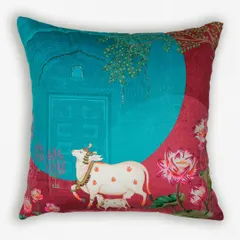 This cushion from our Pichwai collection features the sacred cow, or 'Kamdhenu', set against a beautifully detailed backdrop. The design is a modern interpretation of a classic art form, printed on luxurious fabric.