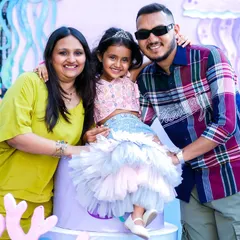 A happy family photo from a mermaid-themed birthday party. Creating these joyful moments for my clients is the best part of my job.