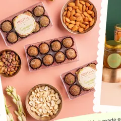 Corporate gifting made easy, healthy, and memorable. This image showcases my assorted laddoo boxes and dry fruit jars, perfect for impressing colleagues and clients during the festive season.
