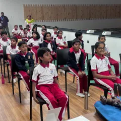 An attentive group of students from Carmel Academy during an introductory session. We begin with the basics of safety and theory before any student handles a weapon, ensuring a strong foundation of knowledge.