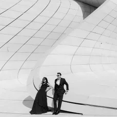 A moment of quiet grandeur in Baku, Azerbaijan. I love using dramatic architecture and monochrome tones to create timeless, high-fashion portraits that feel like a still from a classic film. This shows how a destination pre-wedding shoot can be both epic and deeply personal.