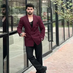 A bold statement with our maroon double-breasted blazer, worn by model Saurav Rathor. This is a great rental option for cocktail parties or fashion-forward events.