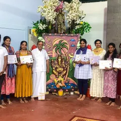 A graduation moment with students receiving their certificates. Celebrating their hard work and dedication is one of the most fulfilling parts of my work.