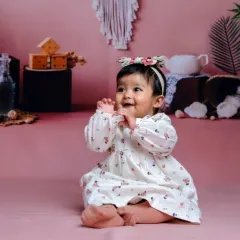 A bundle of joy with a touch of magic. Her happy claps and sweet smile are everything.
