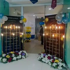 Celebrating a company milestone requires a special touch. I designed and set up these custom standees and entrance decor for a corporate anniversary, highlighting the company's achievement right at the entryway.
