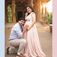 The dad-to-be listening to his baby's heartbeat is one of our favorite poses. It’s a simple, heartfelt moment that speaks volumes about the bond that's already forming.