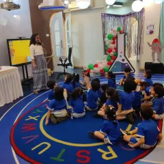 A full classroom of students listening intently during a school workshop. We can handle large groups, making our sessions perfect for school-wide science days.