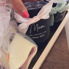 A gift for the new parents is a thoughtful touch. I included these personalized "Mom" and "Dad" tumblers in the half-birthday hamper to celebrate their journey too.