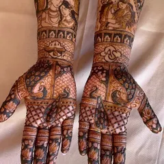 A close-up angle of the divine couple portraits, highlighting the shading and fine line work that bring the figures to life.