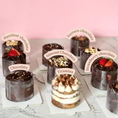 Can't decide on just one flavor? Our Mini Cakes Collection is for you. Mix and match any four of your favorites, from classic Chocolate to Tiramisu, to create your own perfect box of indulgence.