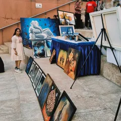 A quick snippet from our Sublime Fiesta, showing an artist displaying her vibrant collection of paintings in an open, accessible setting.