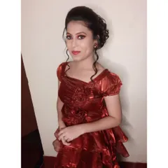 A full view of the party look. The makeup is bold yet elegant, and the hairstyle is designed to stay in place while she enjoys her event.