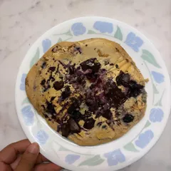 This is a blueberry and dark chocolate protein pancake I made. It's a perfect example of how you can have delicious food that also helps you hit your protein goals. Eating healthy doesn't mean you have to give up everything you love.