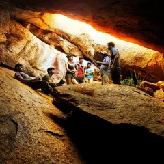 Journey into the earth with our guided cave exploration. Our experts lead a group through ancient rock formations, sharing stories and insights about these natural wonders.