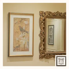 This Rococo-style gold frame mirror is a statement piece in itself. Its intricate carvings and luxurious finish make it a perfect decorative accent for a classic or baroque-inspired interior.